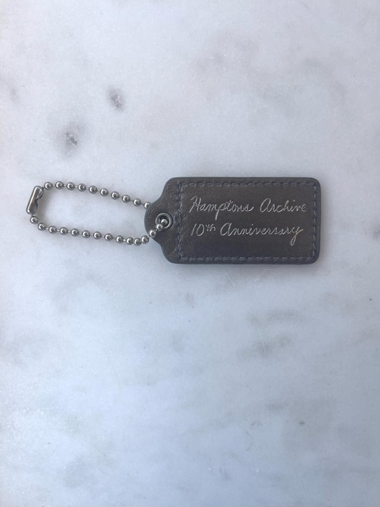Coach Accessories - COACH HAMPTONS ARCHIVE 10TH ANNIVERSARY Silver Leather Hang Tag INQUIRE WITHIN